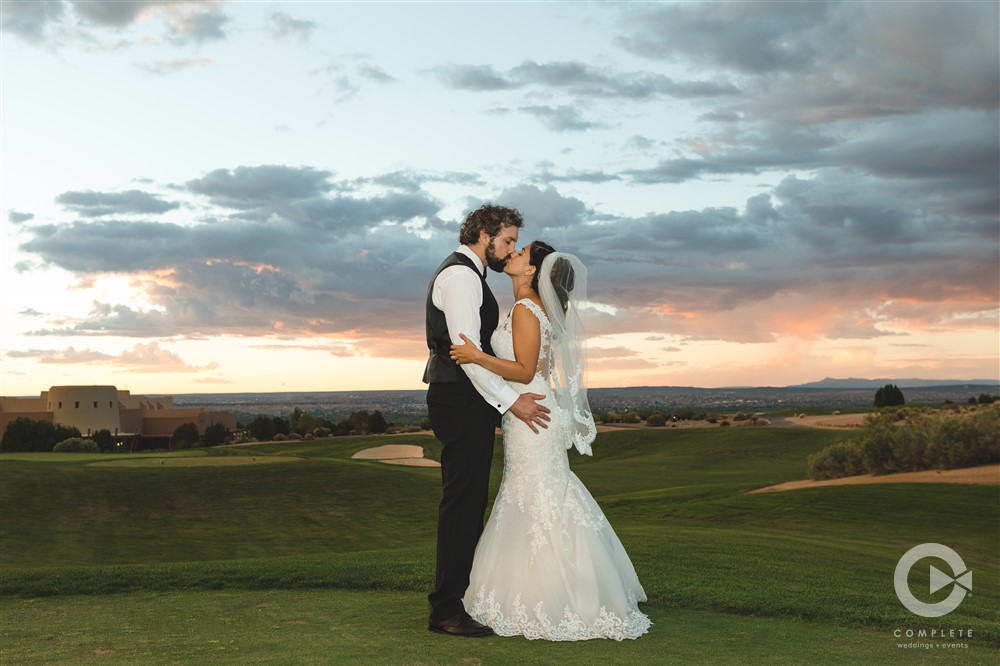 op Items to Add to your Wedding Registry Albuquerque wedding Event Center at Sandia Golf Club bride and groom sunset shot