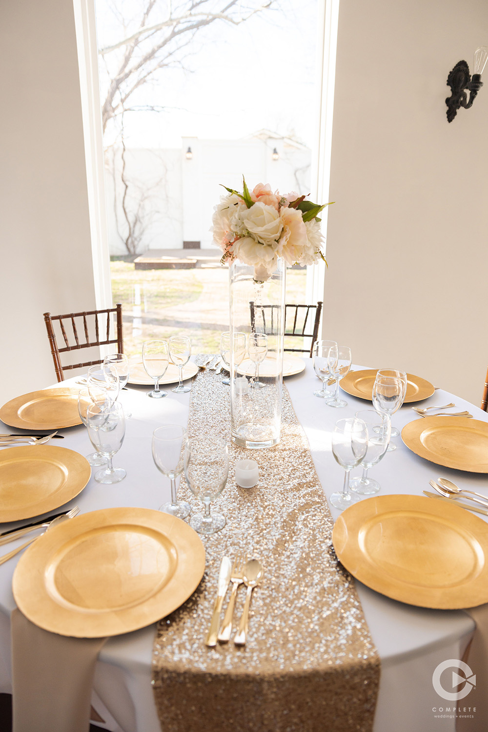 gold wedding decor on tables