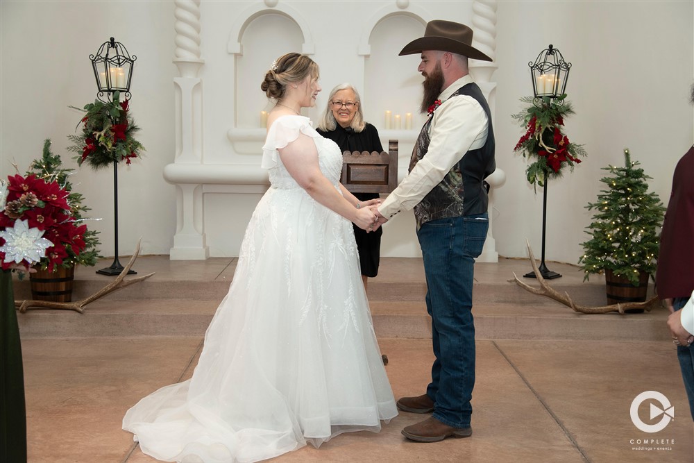 wedding photography couple exchanges vows Old Town Hotel Albuquerque Chapel