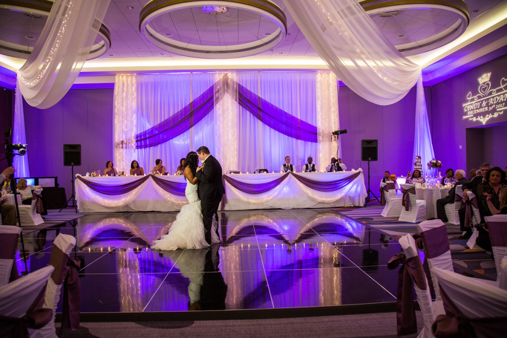 purple draping backdrops twinkle lights dancefloor