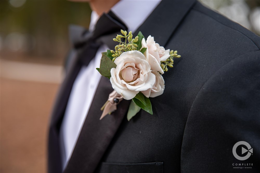Flower Groom wear a suit or tuxedo