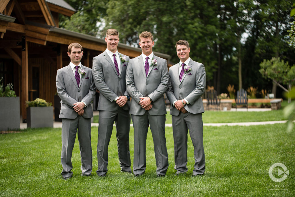Outdoor shot of groomsmen purple ties