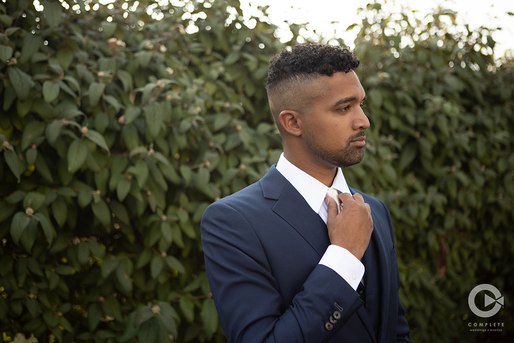 Groom white and navy suit