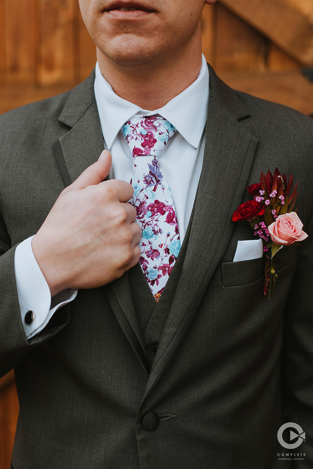 purple blue floral tie on groom