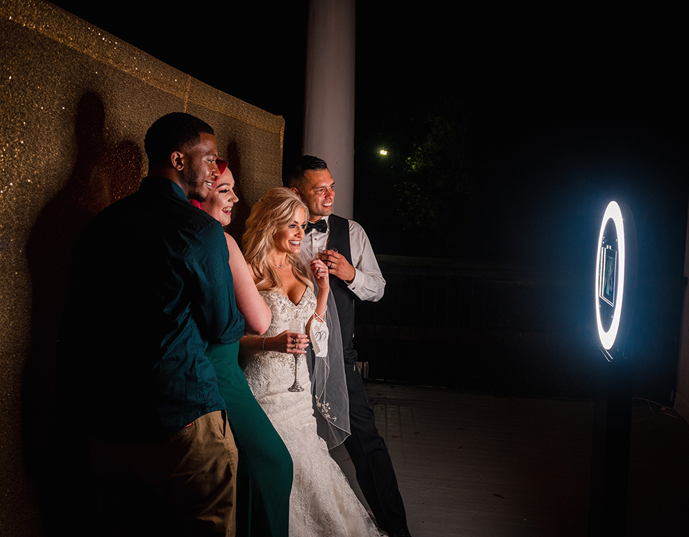 Wedding Guests Smile for a Photo - Photo Booth