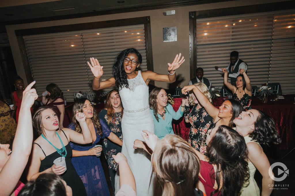Fun bride dancing at wedding