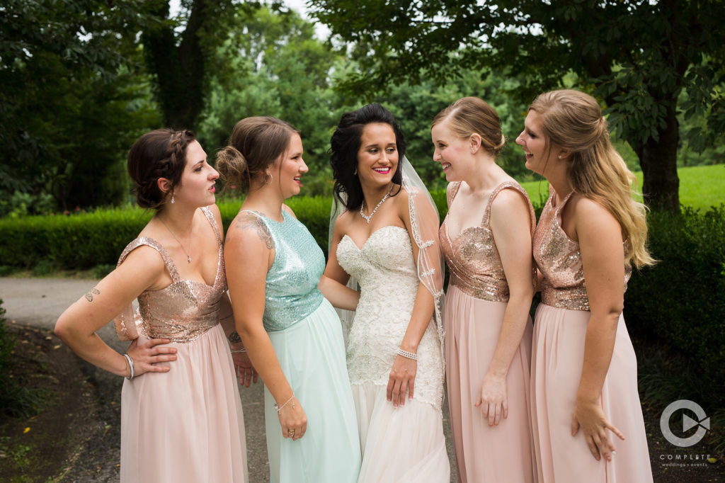bride and bridesmaids smiling
