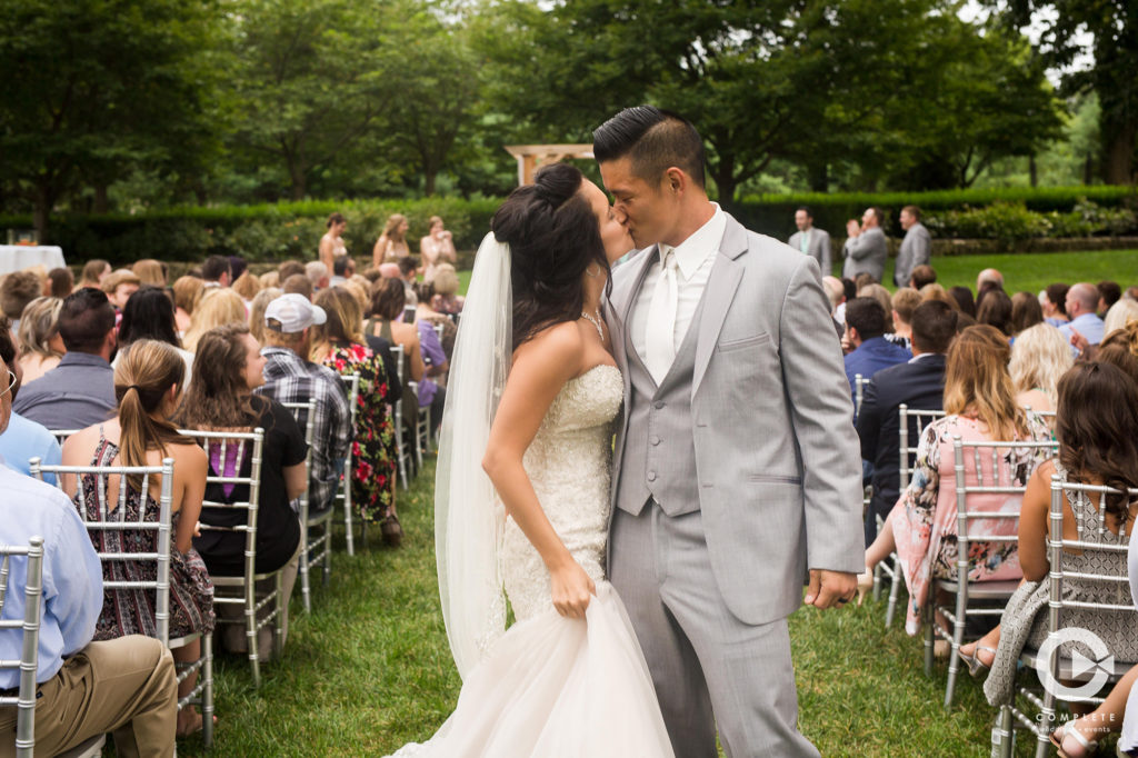 bride and groom kiss ceremony
