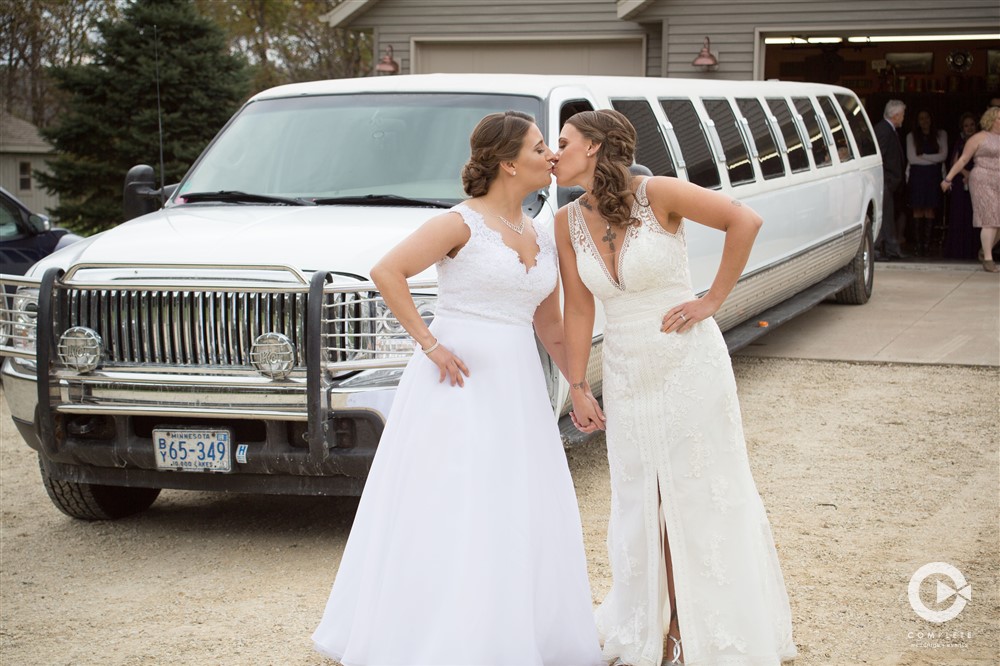 Brides in front of Limo Winona Minnesota