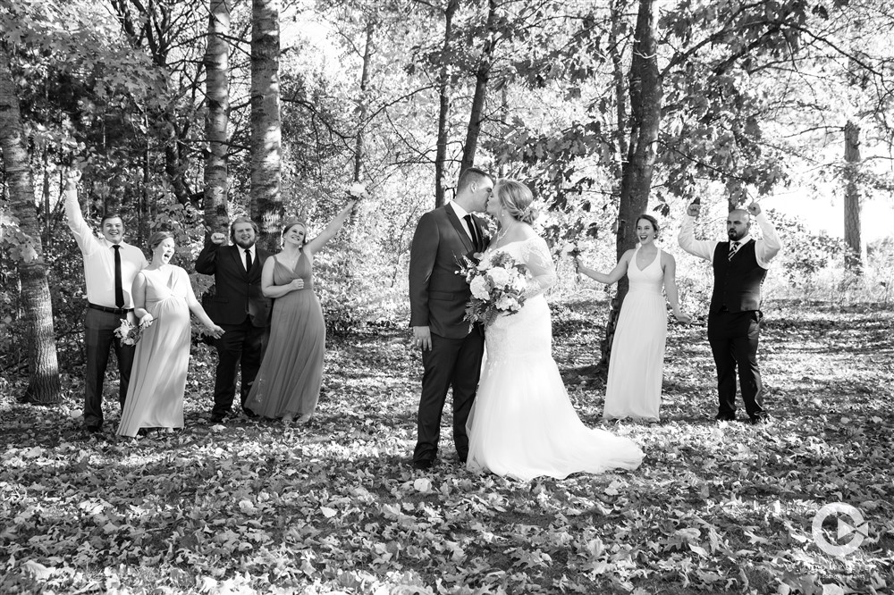 Black and white photo of wedding party outdoor photos