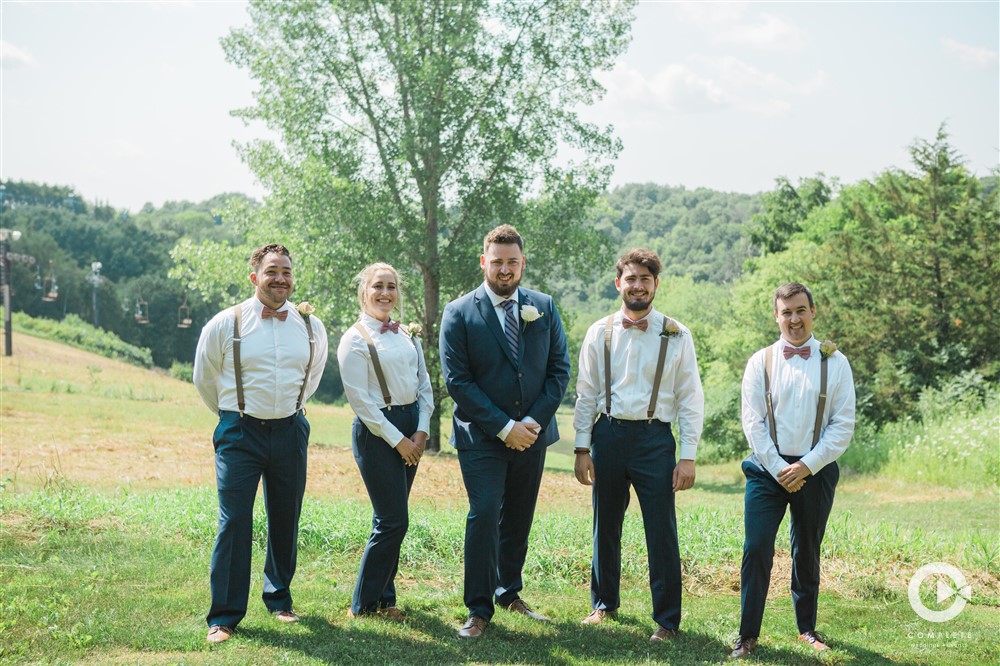 groom's party in suspenders