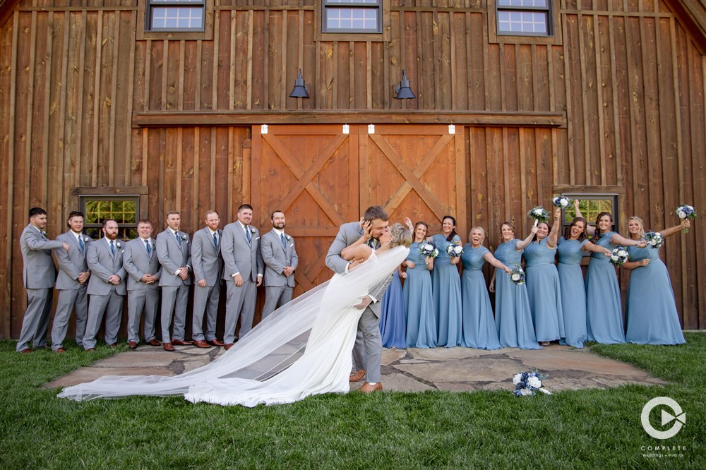 bride, groom, complete weddings + events photography, wedding photographer, bridesmaids, groomsmen, bride and groom kissing