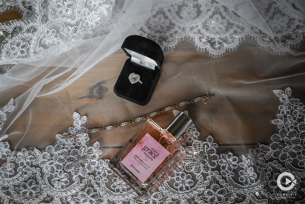 Illinois wedding detail shot of ring and perfume