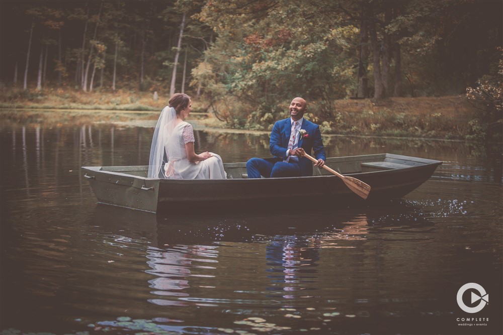 Wedding couple on a paddleboat after ceremony