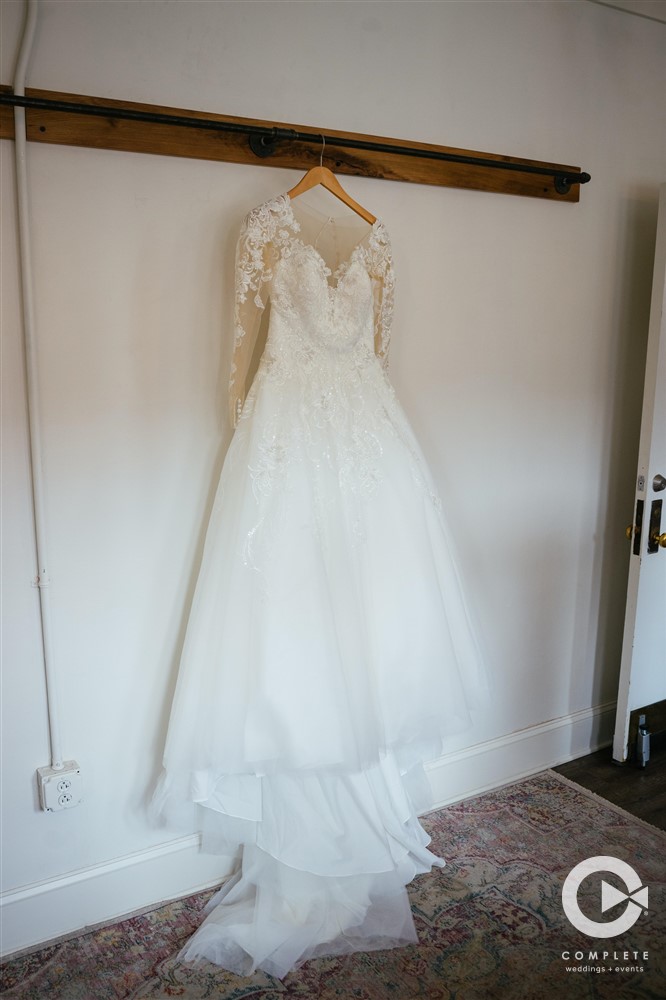 dress hanging in a bridal suite