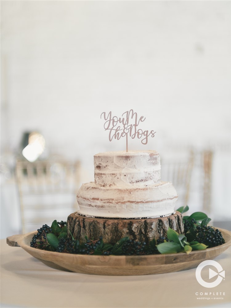 You Me, and the Dogs Cake Topper on Wedding Cake