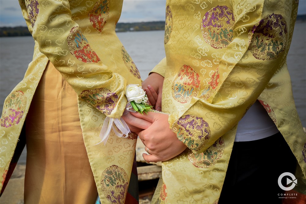 Couple Holding Hands in Traditional Wear