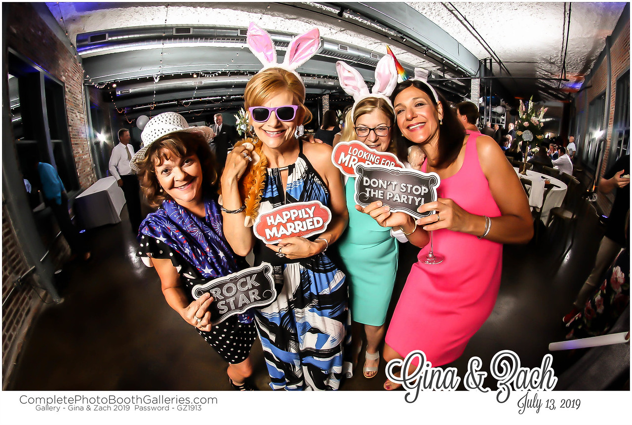 entertainment ideas - Guests using Photo Booth Props