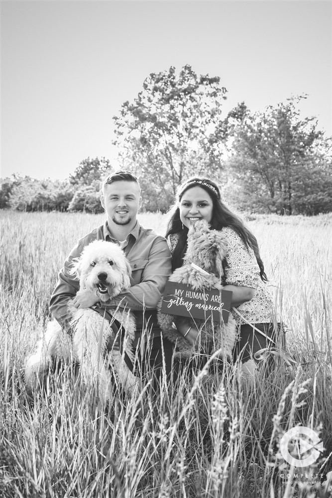 engagement photo with dogs