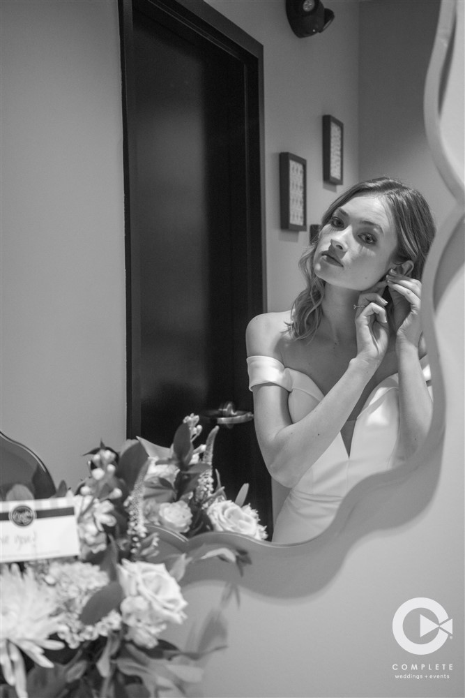 Complete Weddings + Events Photography, Wedding Portraits, Bride getting ready, bride looking in the mirror