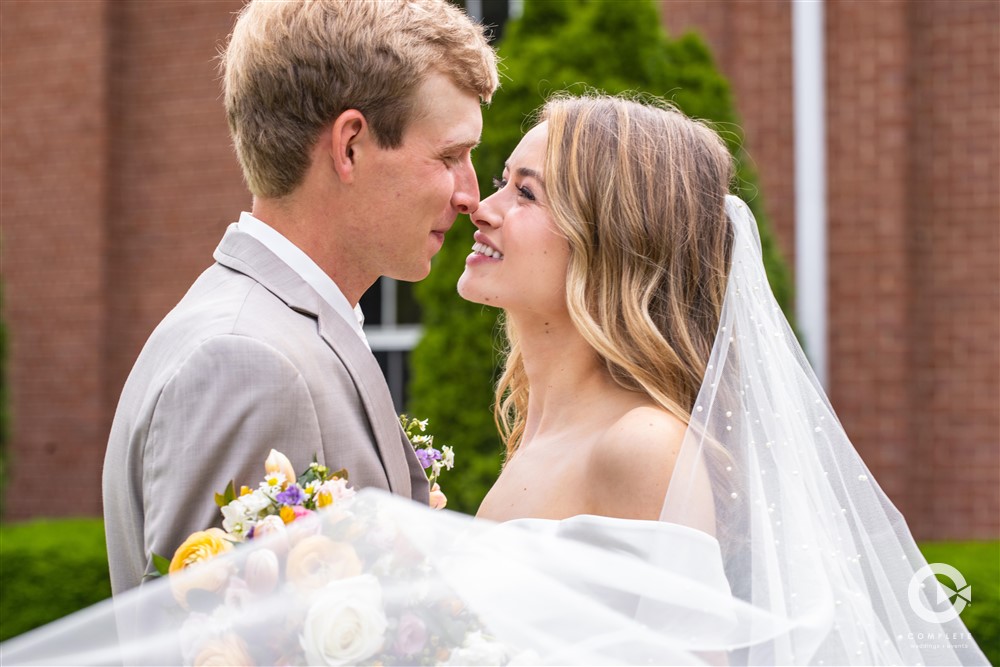 Complete Weddings + Events Photography, Wedding Portraits, Bride and Groom kissing