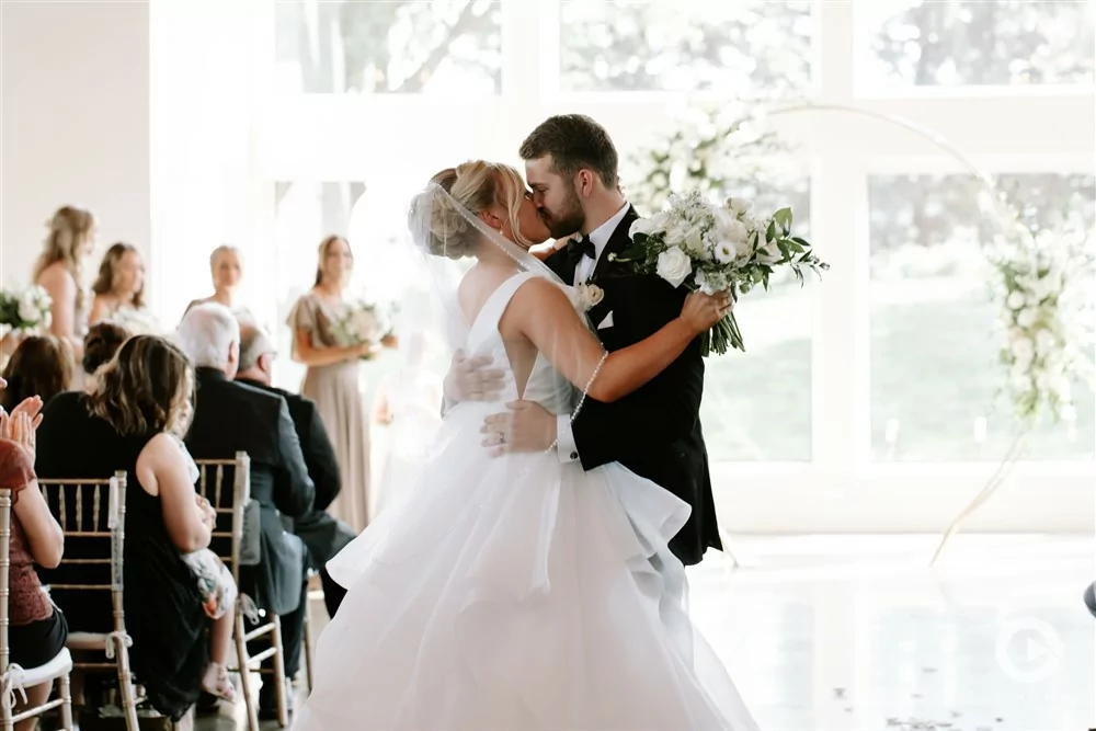 Complete Weddings + Events Photography, wedding ceremony, first kiss