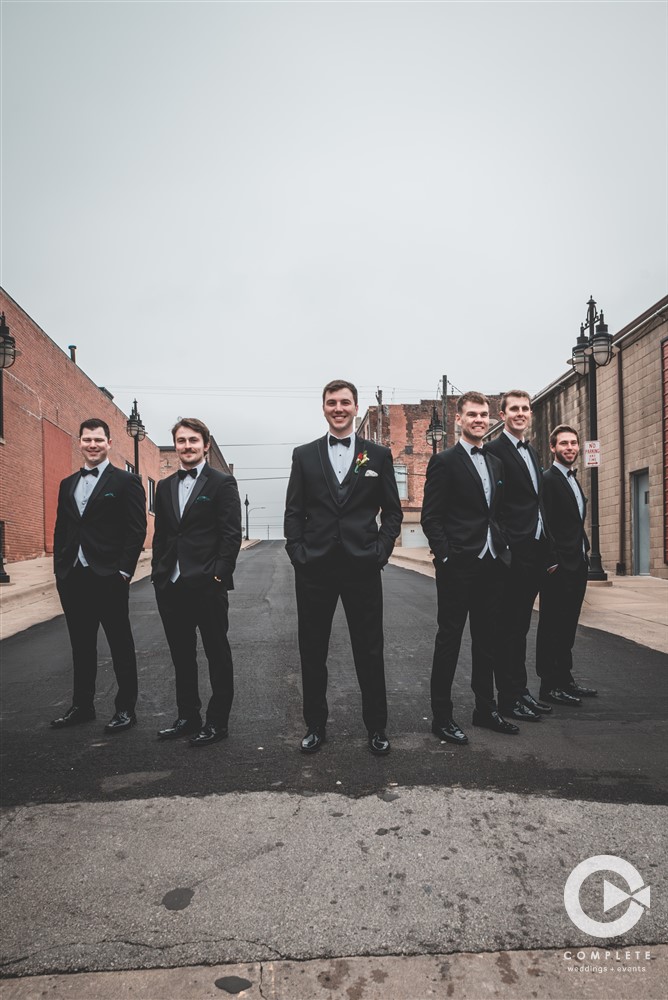 Complete Weddings + Events Photography, groom posing with his groomsmen, wedding party photos