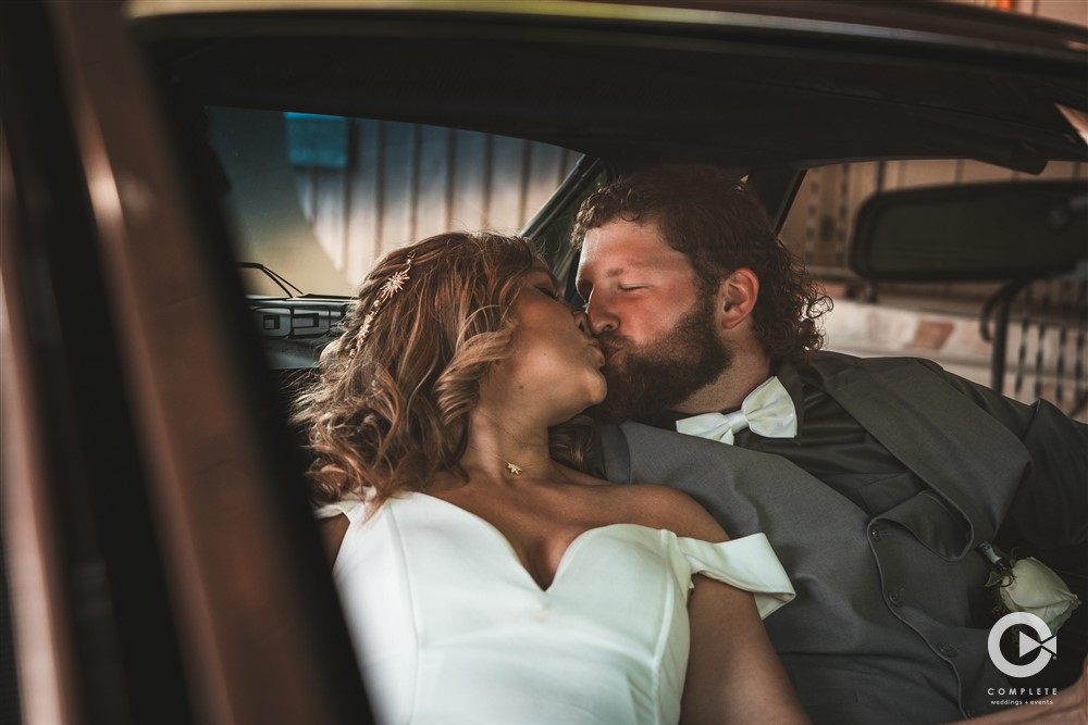 Complete Weddings + Events Photography, Weddings portraits, bride and groom kissing