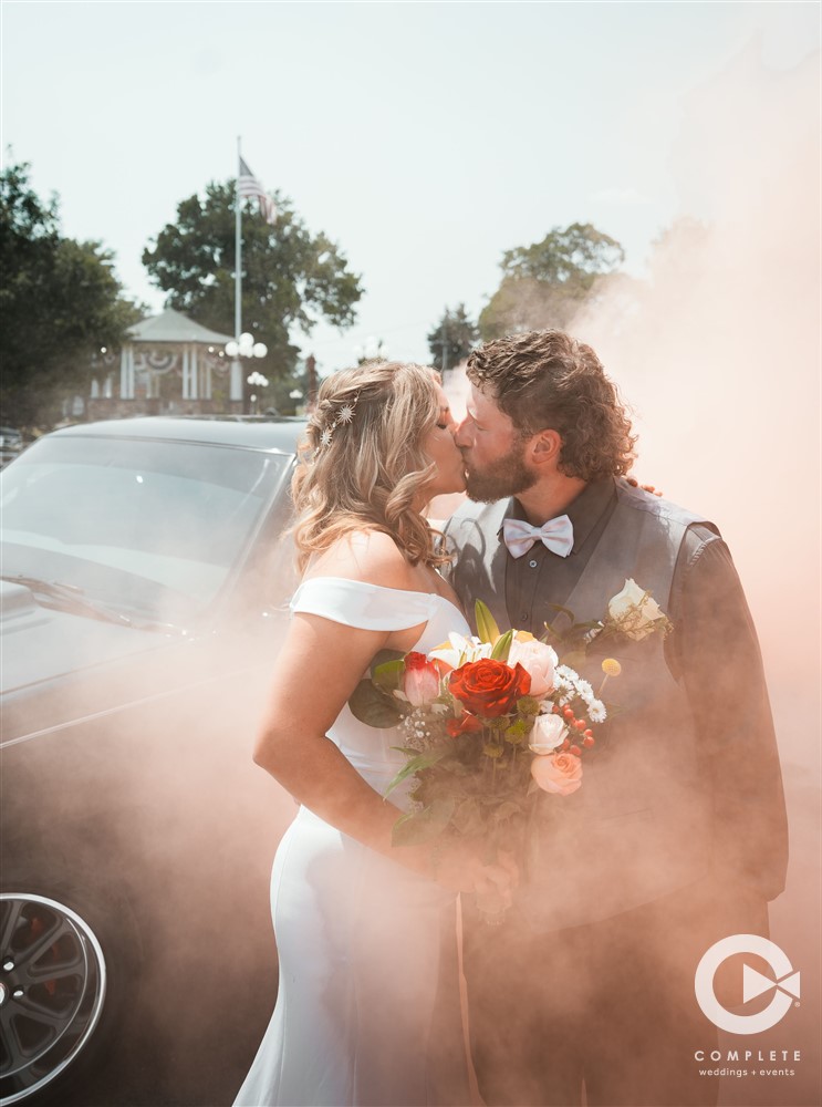 Complete Weddings + Events Photography, Weddings portraits, bride and groom kissing, wedding smoke bomb photo