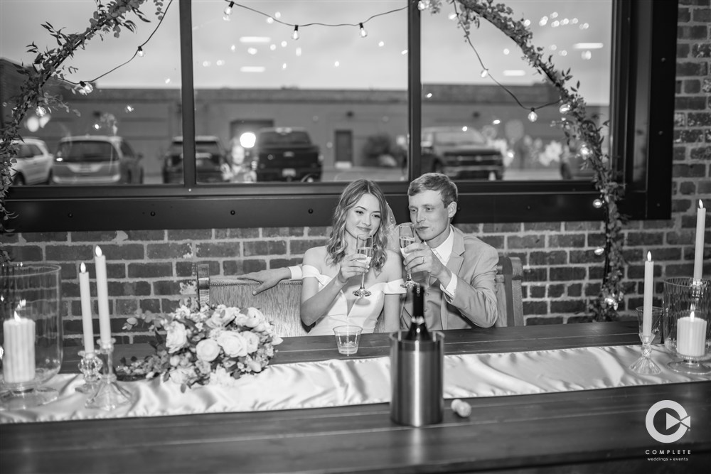 Complete Weddings + Events Photography, Wedding portraits, wedding photos, wedding reception, bride and groom drinking champage