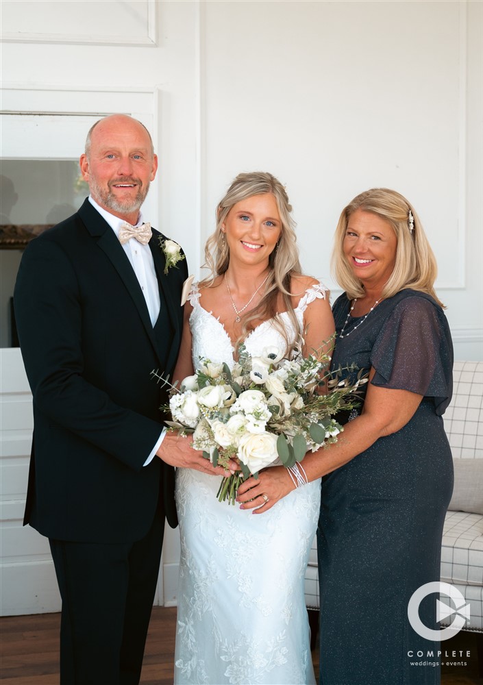 Complete Weddings + Events Photography, Wedding detail photos, wedding bouquet, bride with her parents on her wedding day