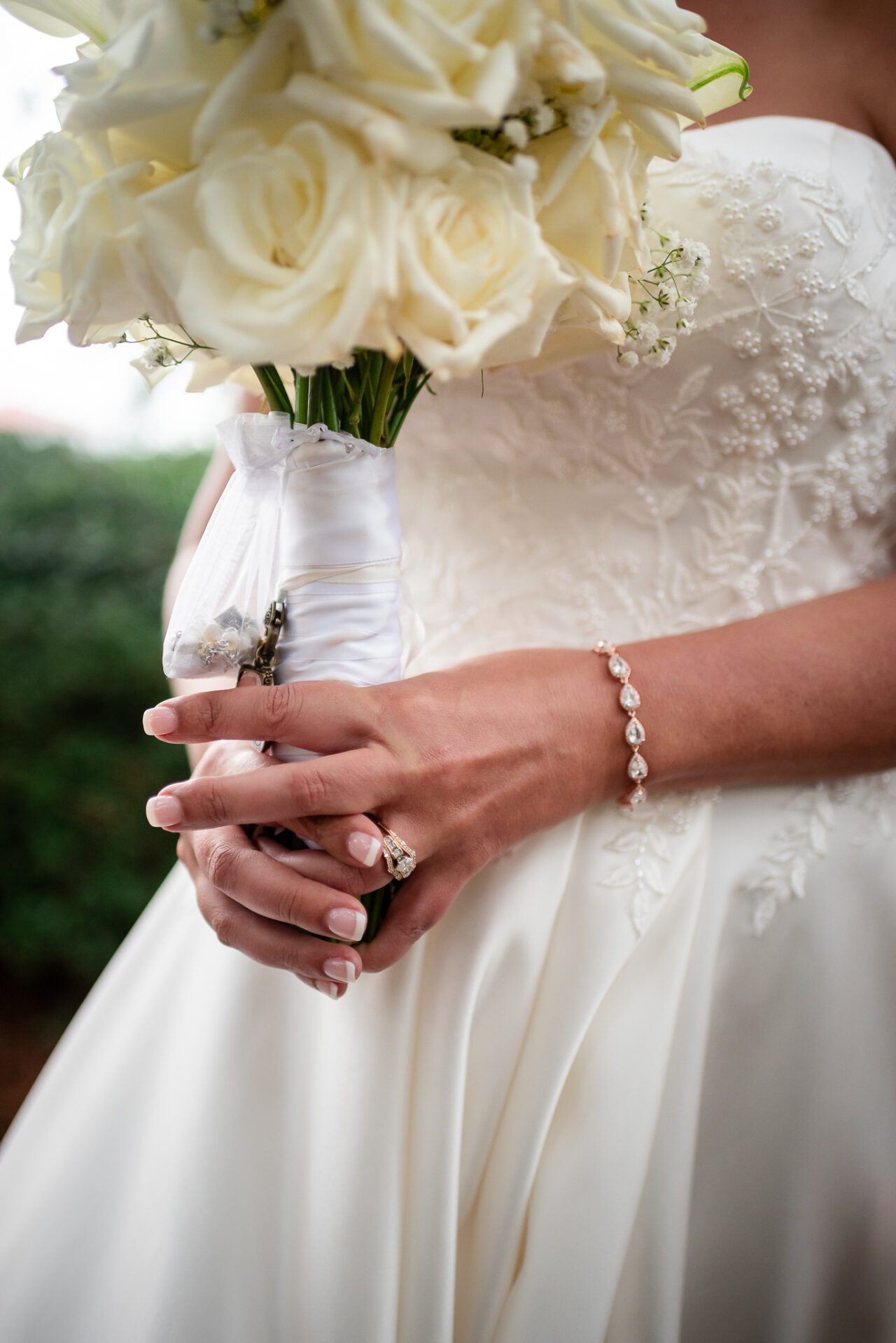 Bride holding wedding flowers