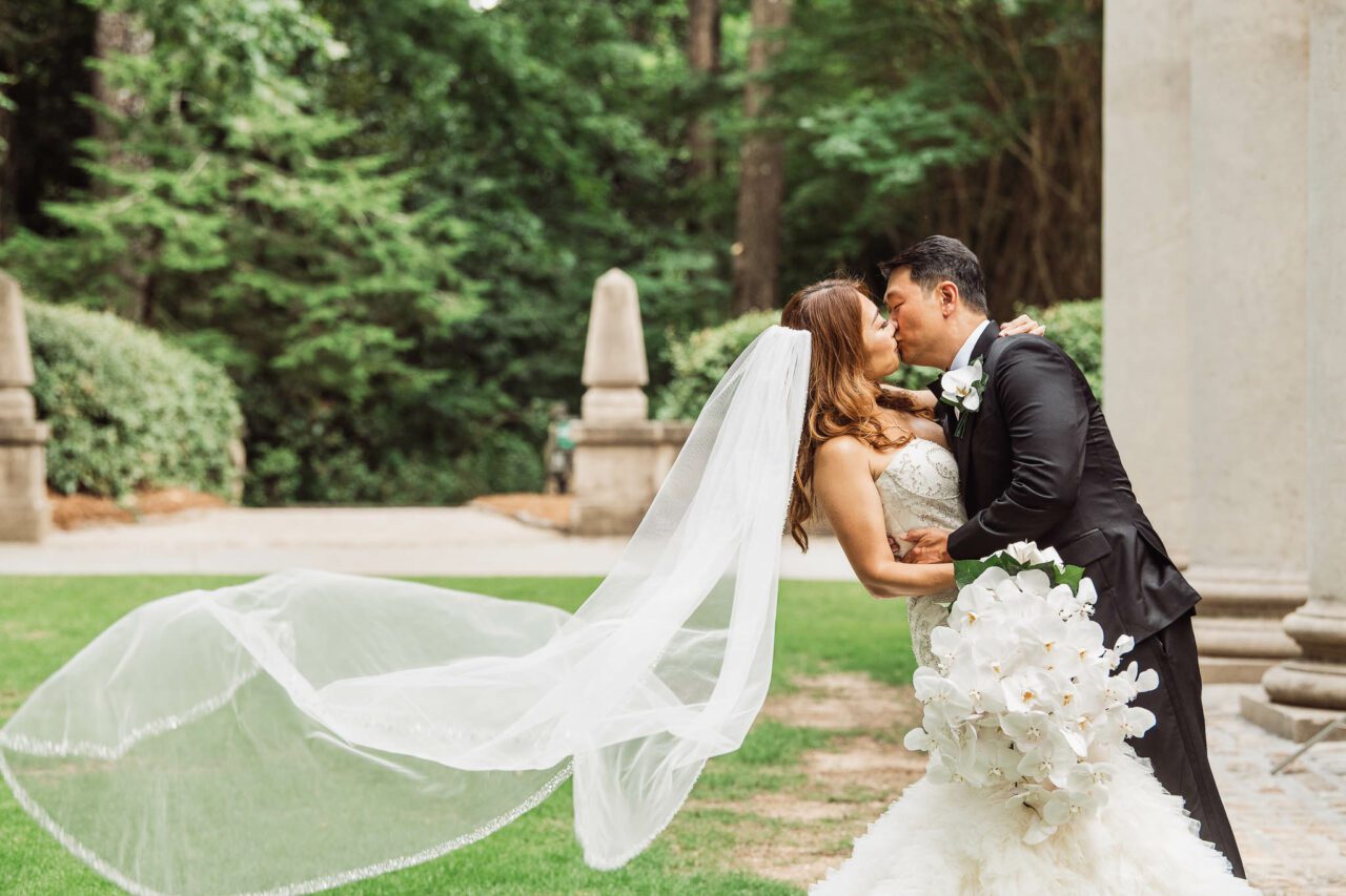 wind blowing veil during wedding pictures