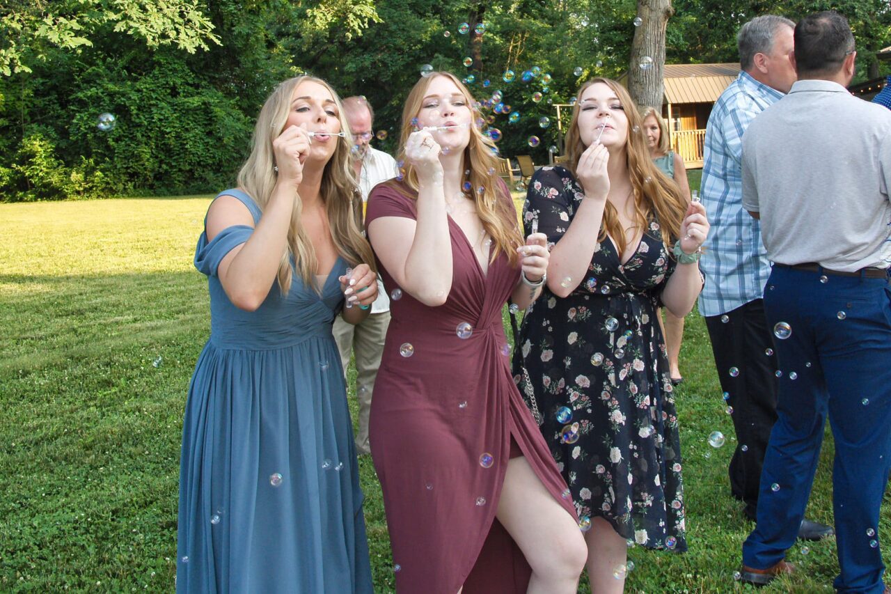 What to wear to a wedding with these girl blowing bubbles.