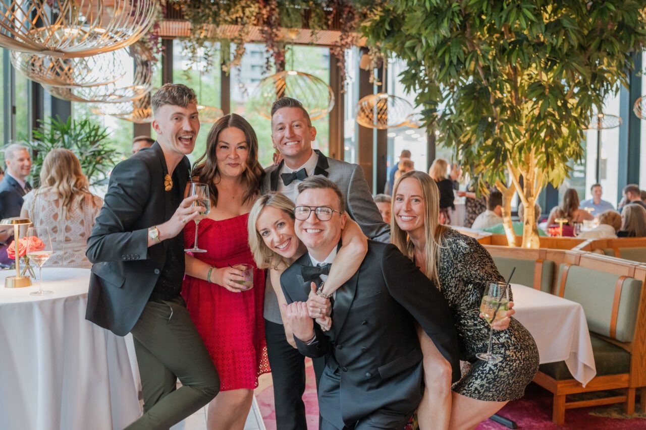 The two Grooms celebrate with their friends and family. The photographer Michael Evans is the owner of Complete Weddings and Events Cincinnati.