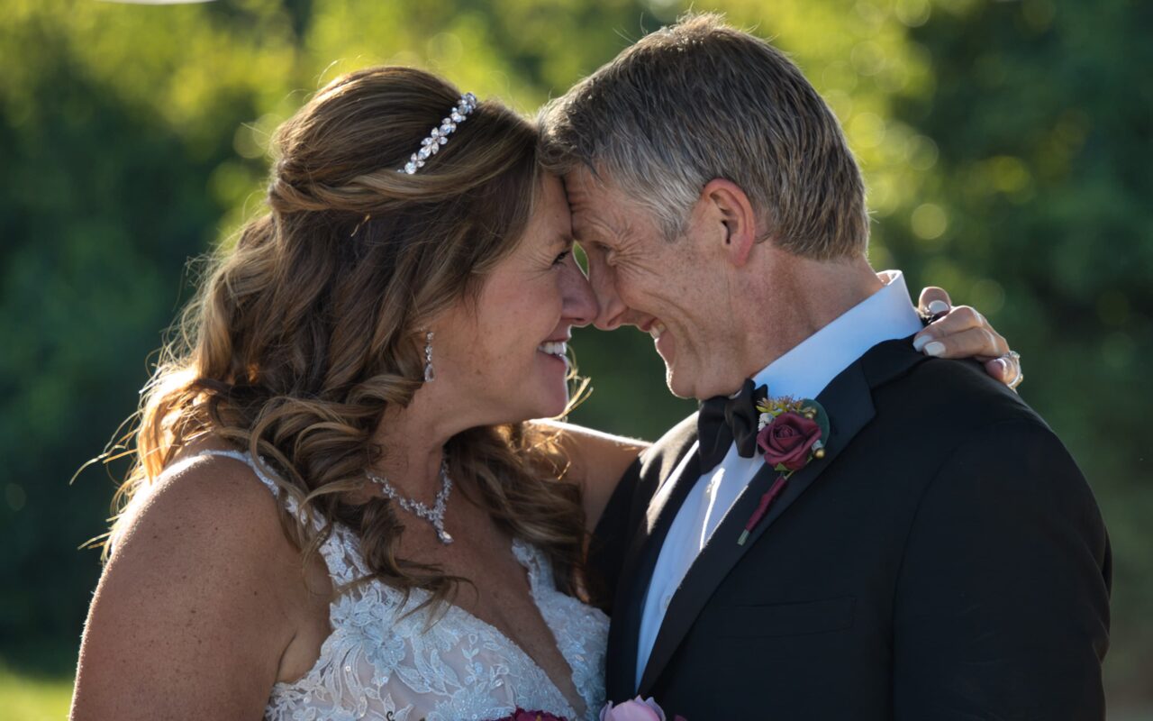 Bride and Groom touching foreheads and gazing into one another's eyes. Michael Evans of Complete Weddings + Events Cincinnati is the photographer.