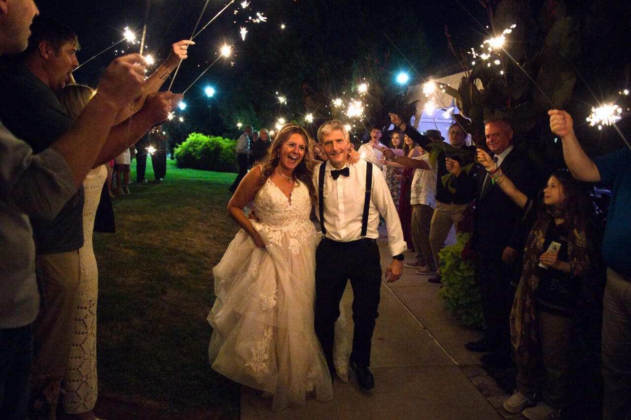 Bride and Groom make their grand sparkler exit. Photo by Michael Evans of Complete Weddings + Events Cincinnati.