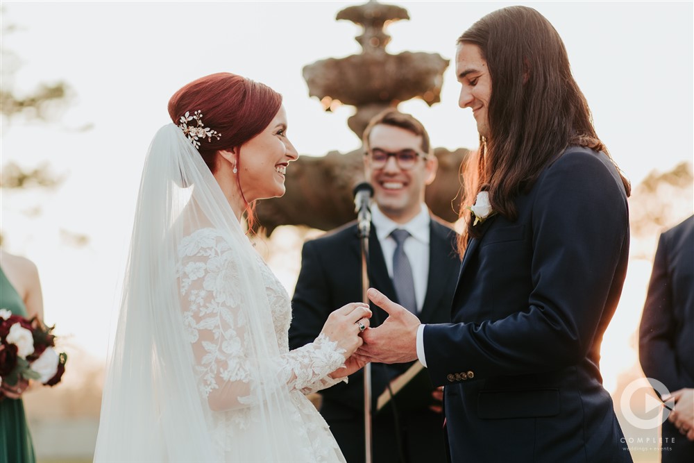 wedding ceremony outdoors in front of fountain