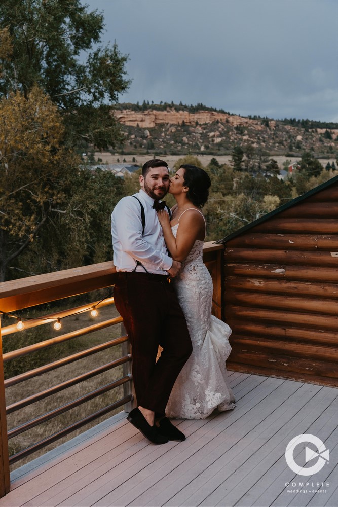 bride and groom and mountain background