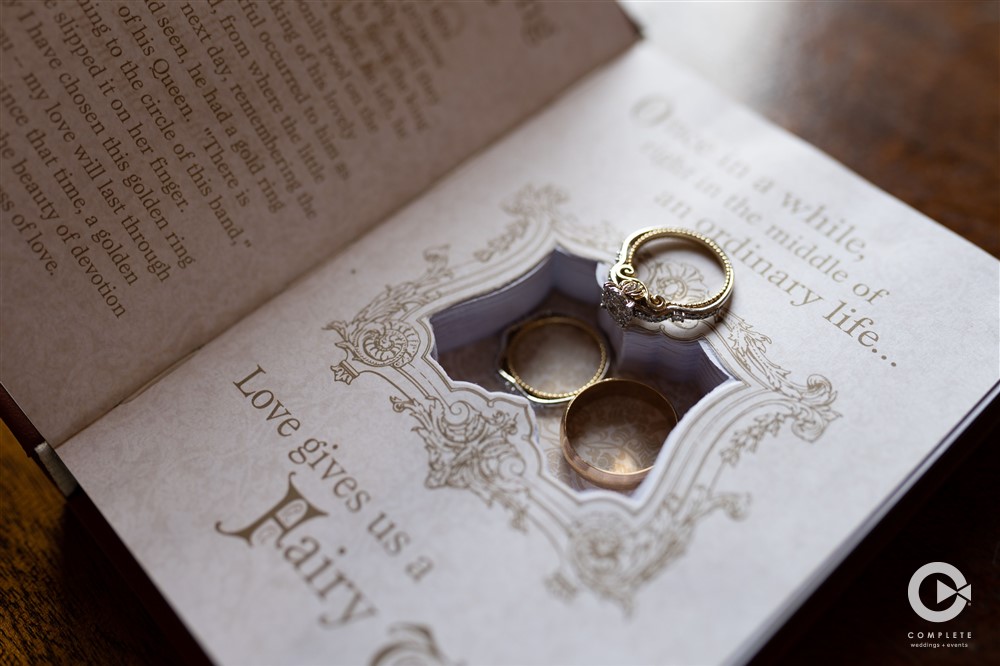 Colorado Springs wedding detail shot of rings in Harry Potter book