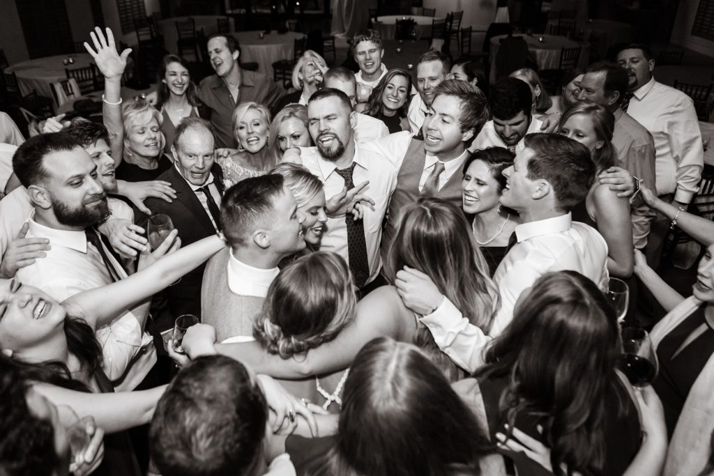 Colorado Springs DJ party in black and white photo during wedding