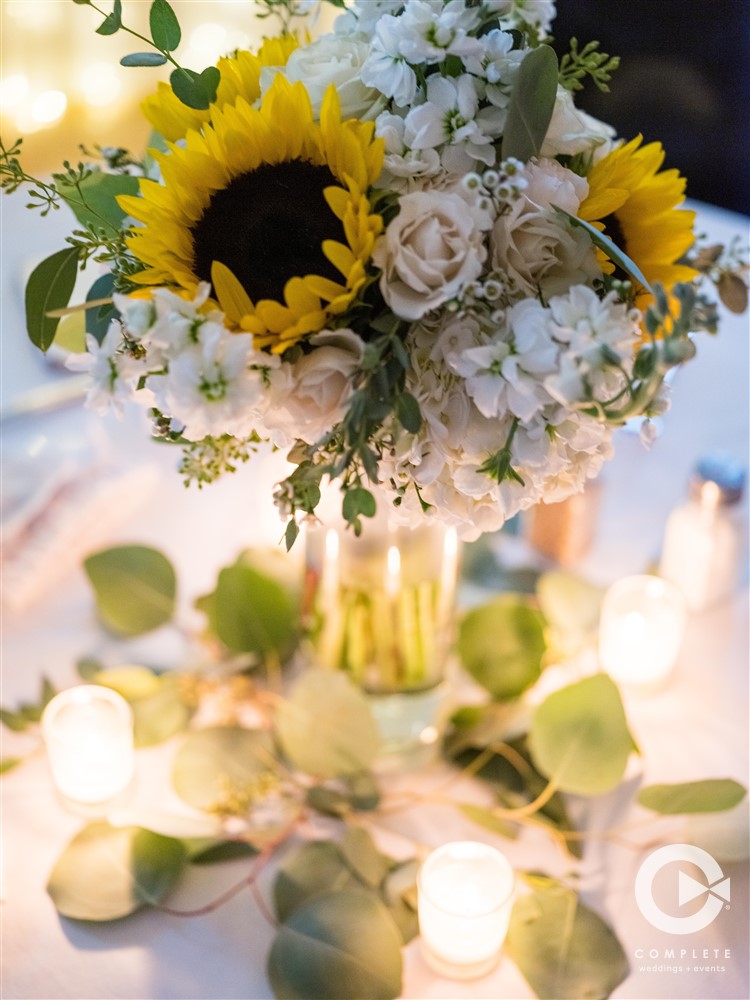 yellow sunflowers at center piece
