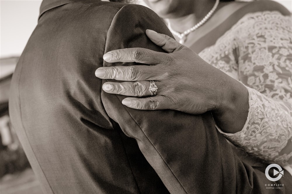 Wedding ring on bride black and white portrait shot during winter wedding