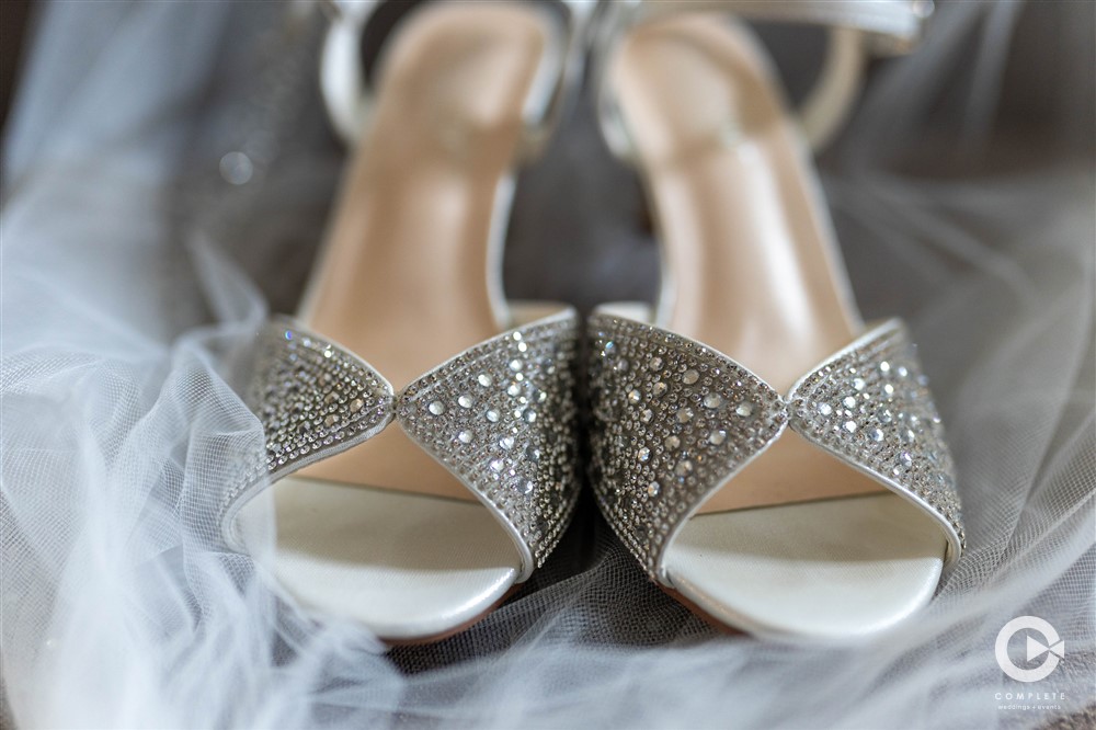 High heel shoes bedazzled worn during a wedding reception at Venue 1902 in Sanford