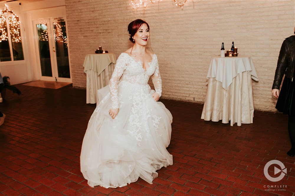 reception dancing by bride