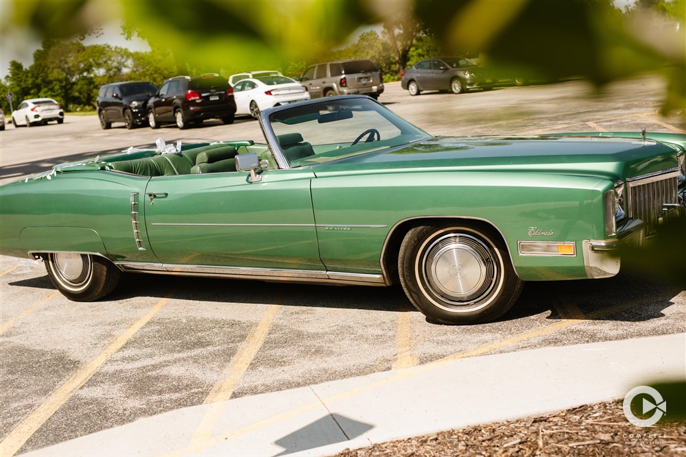 vintage green car at wedding
