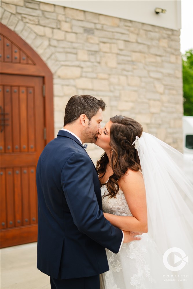 bride, groom, complete weddings + events photography, wedding photography, bride and groom kissing, winery wedding
