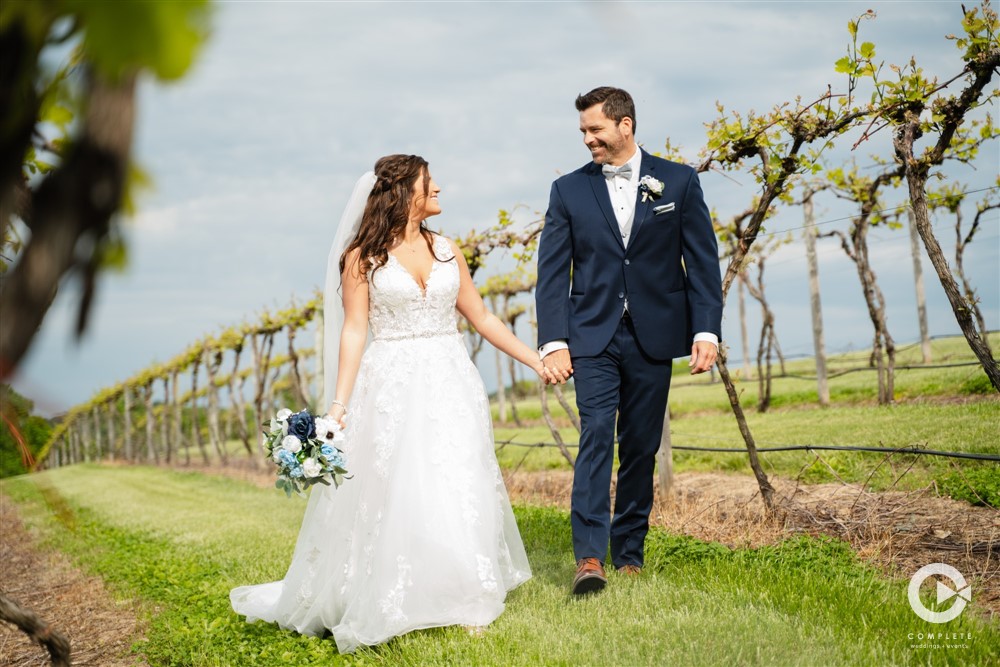 bride, groom, complete weddings + events photography, wedding photography, bride and groom walking, winery wedding