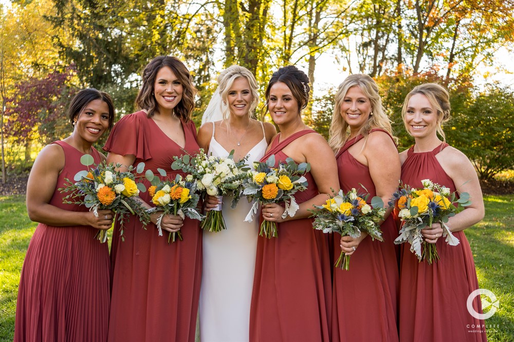 Complete Weddings + Events Photography, bride with bridesmaids, bride smiling, wedding party photos