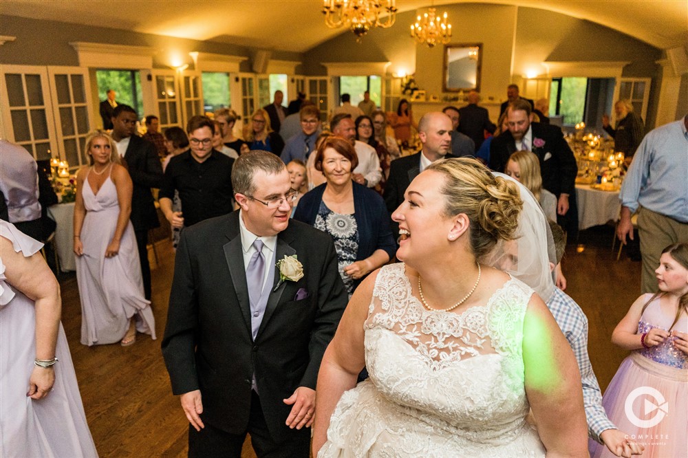 reception, dancing, fun, bride, groom, guests